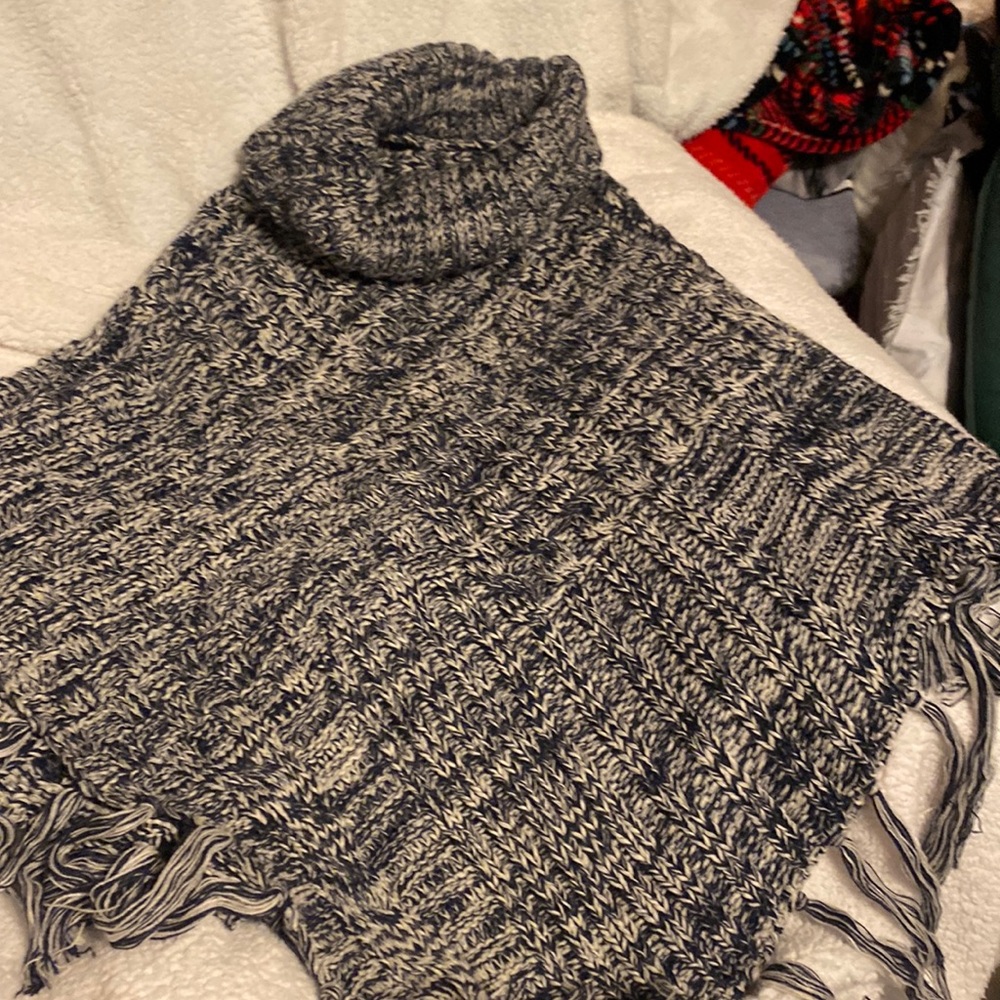 Poncho from FRANCESCA’S. NWT. Turtle neck.  Knit